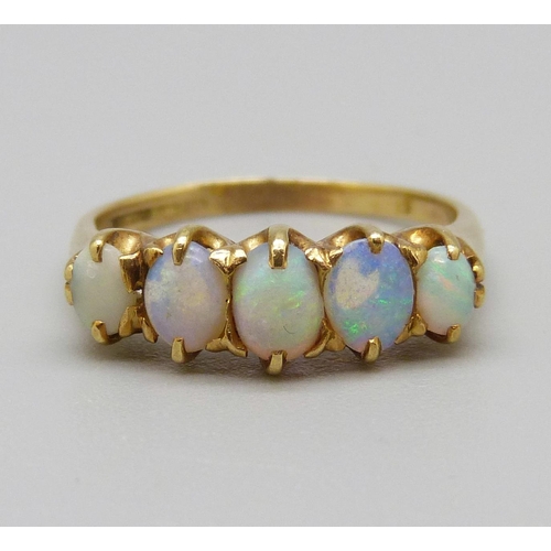 1098 - An yellow metal and five stone opal ring, 3.5g, M, hallmark worn