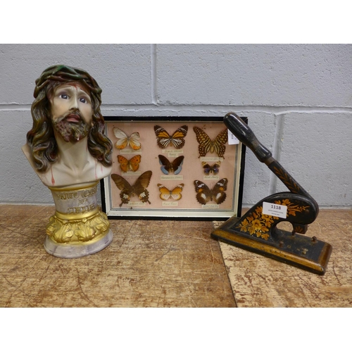 1118 - A bust of Jesus Christ, a 19th Century desk stamp and a cased set of butterflies