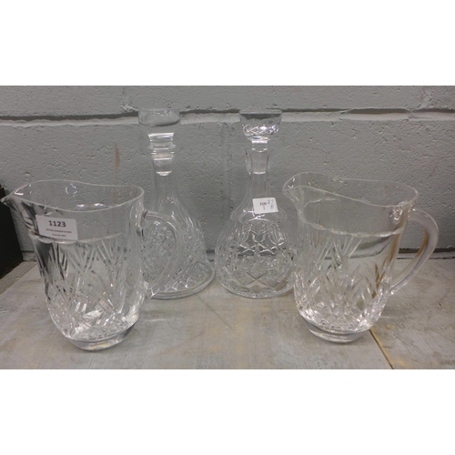 1123 - Two crystal water jugs and two decanters