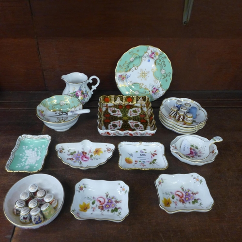 694 - A collection of Royal Crown Derby and Abbeydale pin trays, jug, Royal Worcester cup and saucer, thim... 