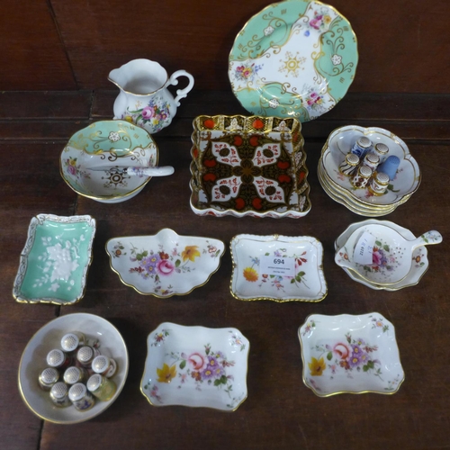 694 - A collection of Royal Crown Derby and Abbeydale pin trays, jug, Royal Worcester cup and saucer, thim... 