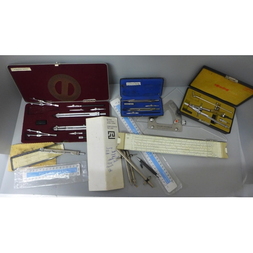 707 - Drawing instruments, slide rules, Rotring compass, etc.