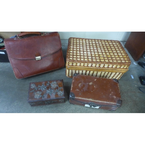 715 - A wicker hamper, a leather satchel, case and wooden box