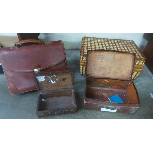 715 - A wicker hamper, a leather satchel, case and wooden box