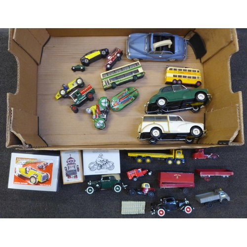 717 - A box of die-cast model vehicles including large Minichamps