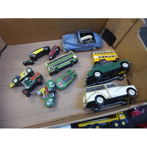 717 - A box of die-cast model vehicles including large Minichamps