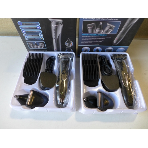 3083 - Two Kemei KM-1407 professional hair clipper sets