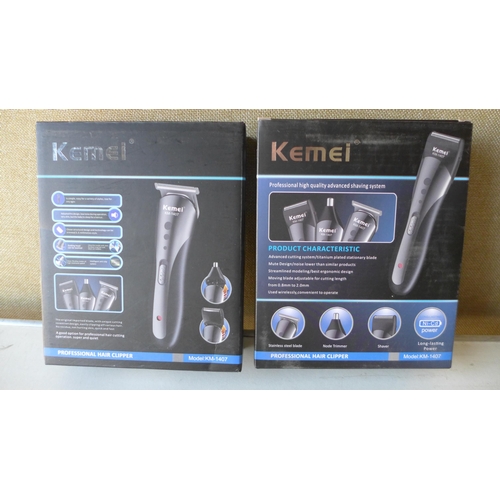 3084 - Two Kemei KM-1407 professional hair clipper sets