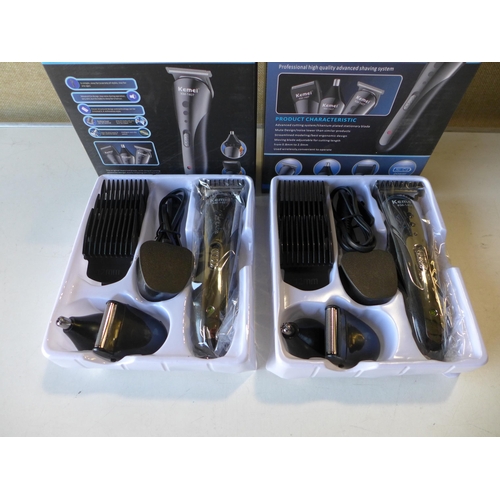 3087 - Two Kemei KM-1407 professional hair clipper sets