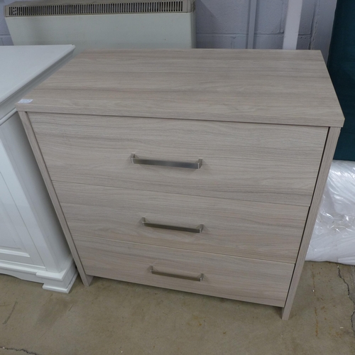 1673 - A  Silver Cross grey washed oak chest of three drawers * This lot is subject to VAT