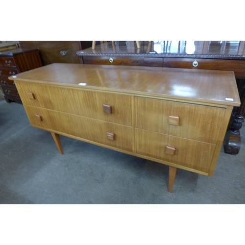 104 - A small teak sideboard