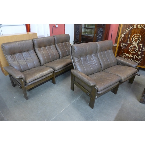 106 - A Danish Skippers Mobler beech and brown leather reclining two piece lounge suite, model no. 7882, d... 