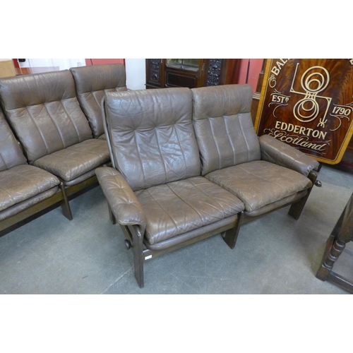 106 - A Danish Skippers Mobler beech and brown leather reclining two piece lounge suite, model no. 7882, d... 