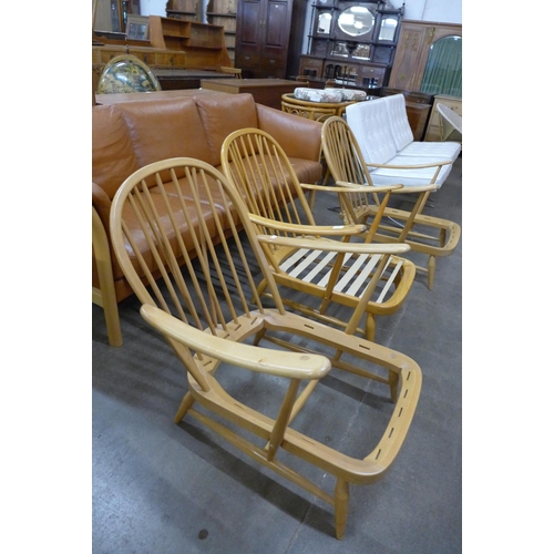 116 - Three Ercol Blonde beech 203 model armchairs