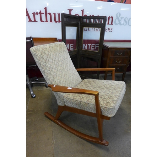 128 - A Danish teak rocking chair