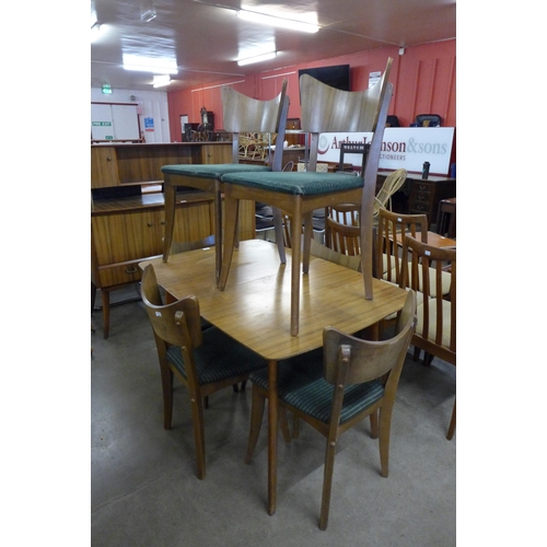 136 - A Vanson afromosia dining table and six chairs