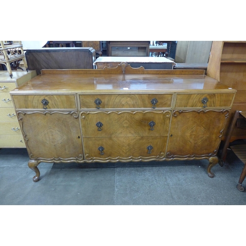 156 - A Queen Anne style walnut sideboard