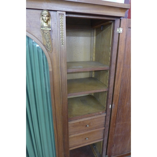 159 - A French Empire style mahogany and gilt metal mounted bibliotheque bookcase