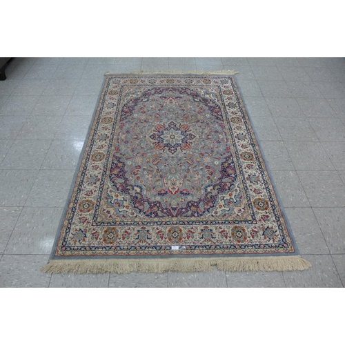 165 - A blue ground Kashmir rug, 204 x 136cms