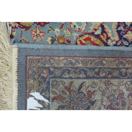 165 - A blue ground Kashmir rug, 204 x 136cms