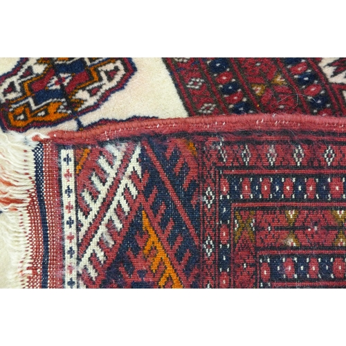 167 - An Eastern red ground rug, 160 x 93cms