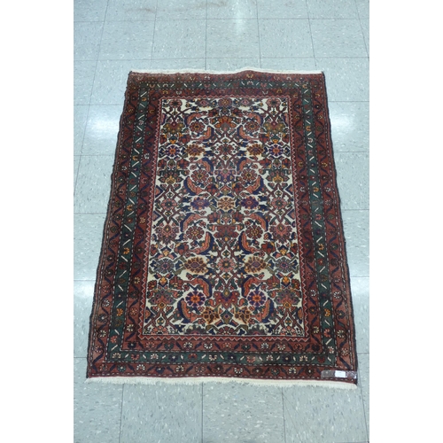 168 - A Persian red ground Shiraz rug, 151 x 106cms