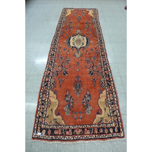 169 - A Persian red ground Hamadan runner rug, 357 x 113cms