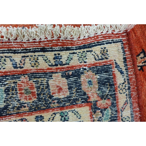 169 - A Persian red ground Hamadan runner rug, 357 x 113cms