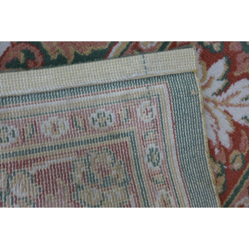 170 - A large green ground rug, 331 x 240cms