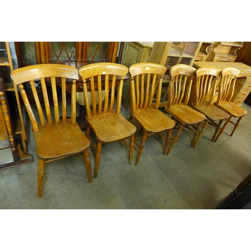 180 - A set of six Victorian elm and beech kitchen chairs