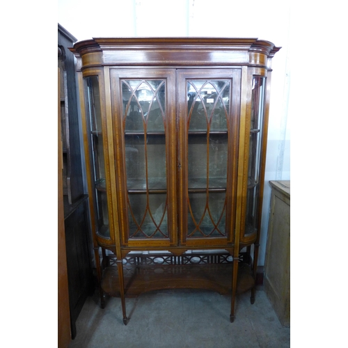 181 - An Edward VII inlaid mahogany display cabinet