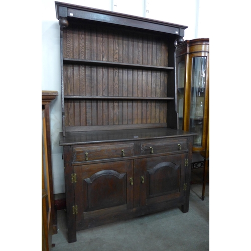 182 - A George III style oak dresser