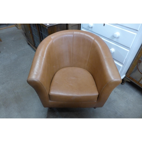 188 - A tan leather tub chair