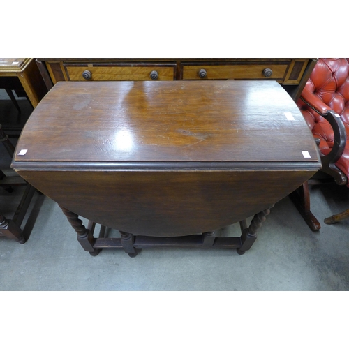 197 - An oak barleytwist gateleg table