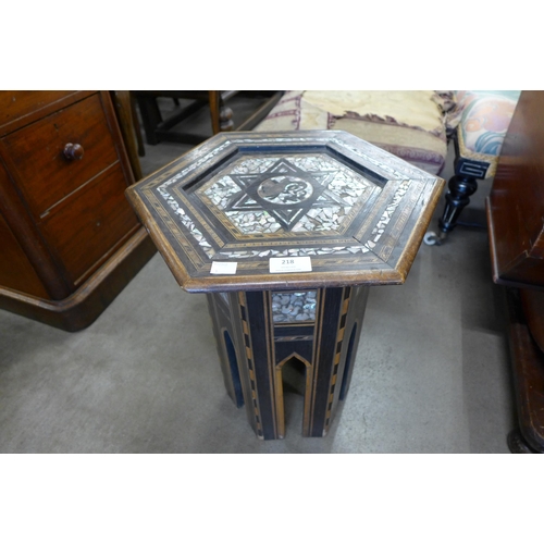 218 - A Moorish mother of pearl inlaid octagonal occasional table