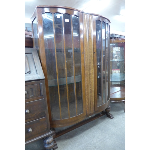 246 - An oak two door display cabinet