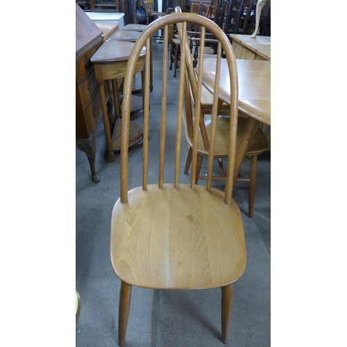 286 - An oak  drop-leaf table and four chairs