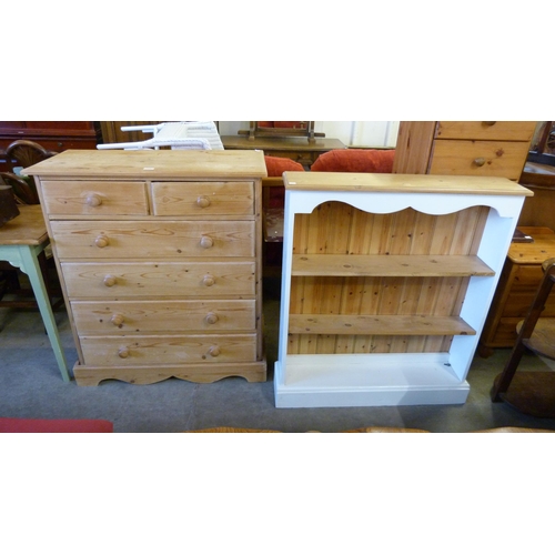 313 - A pine chest of drawers and a bookcase