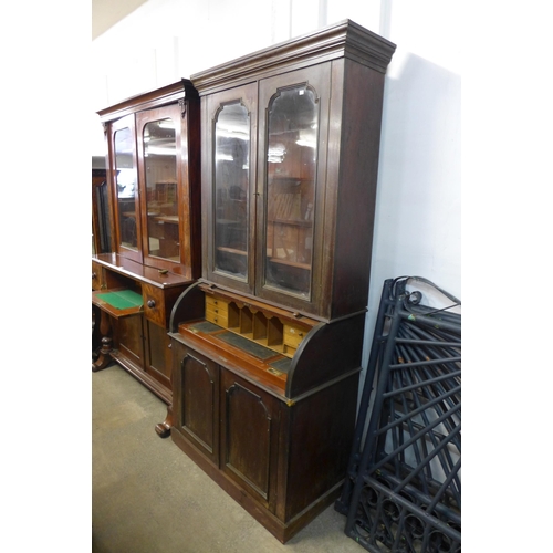 340 - A Victorian mahogany cylinder secretaire bookcase