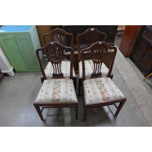 343 - A set of four George III mahogany dining chairs