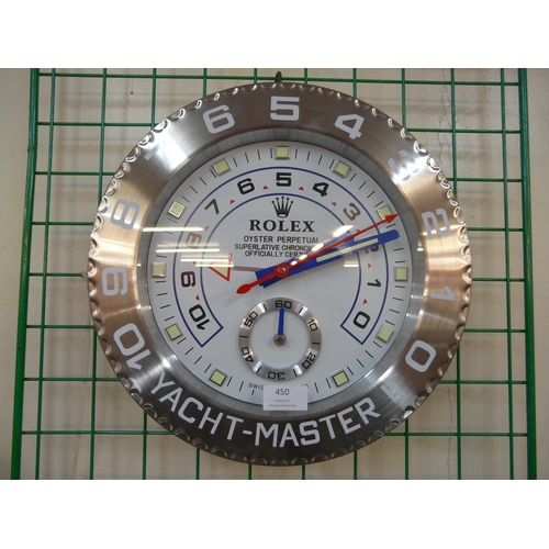 450 - A Rolex style dealer's display wall clock