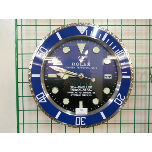 451 - A Rolex style dealer's display wall clock