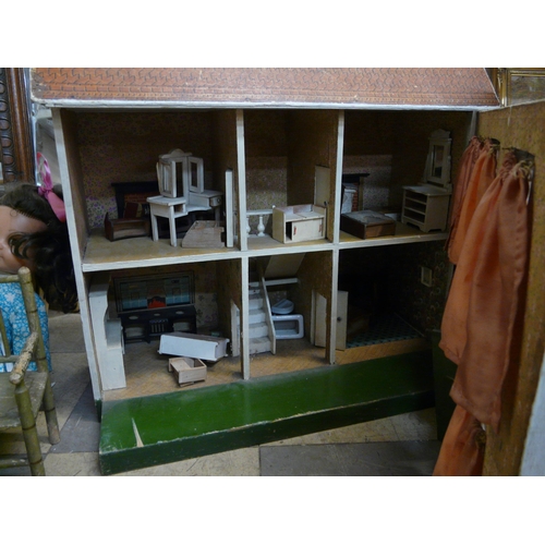 461 - A Georgian style dolls house, a doll and two miniature wooden chairs