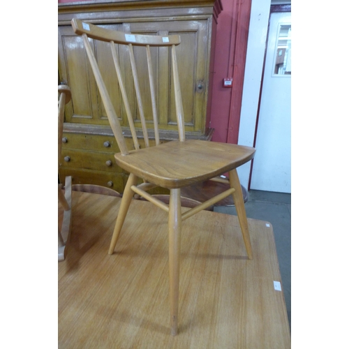 67 - An Ercol Blonde elm and beech 391 model chair