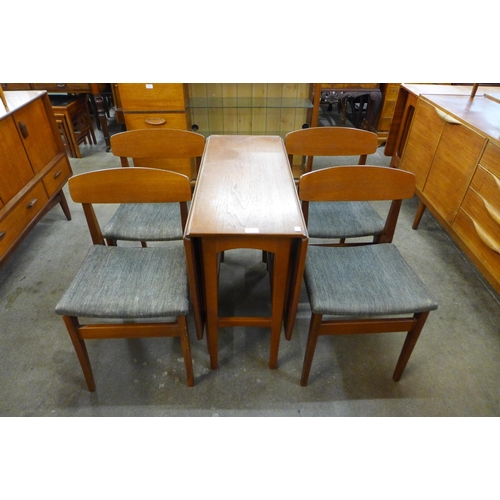 91 - A teak drop-leaf table and four chairs