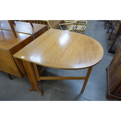 94 - A Nathan teak drop-leaf table