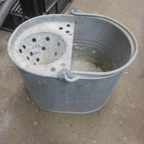 2347 - 2 Metal jugs, metal watering can & metal mop bucket