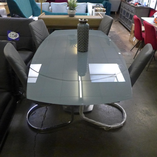 1493 - A Furniture Village Flow glass swivel top dining table with a set of four grey leather effect dining... 