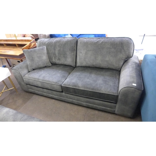 1523 - A crocodile green velvet four seater sofa