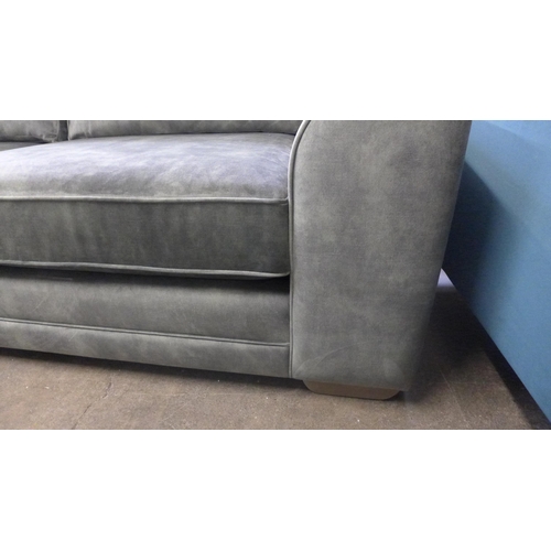 1523 - A crocodile green velvet four seater sofa